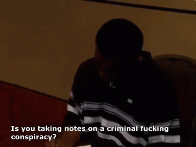 Animated GIF of Stringer Bell (Idris Elba) asking "Is you taking notes on a criminal fucking conspiracy?"