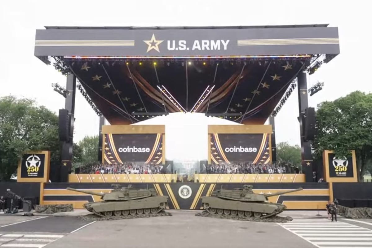 A large stage for the military parade, with “US Army” at the top, and banners showing the Coinbase logo behind