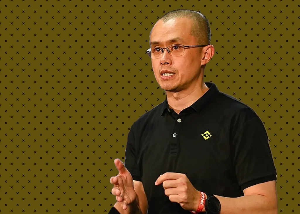 Changpeng Zhao in front of a brown-yellow background