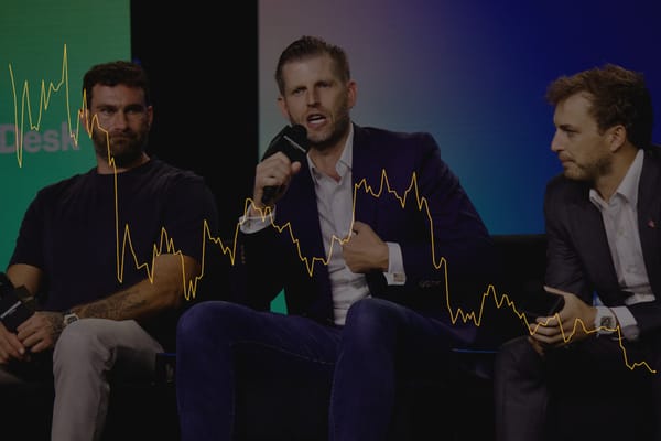 Zak Folkman, Eric Trump, and Zachary Witkoff speak onstage at a conference. Superimposed is the price chart for WLFI, which has dramatically gone down.
