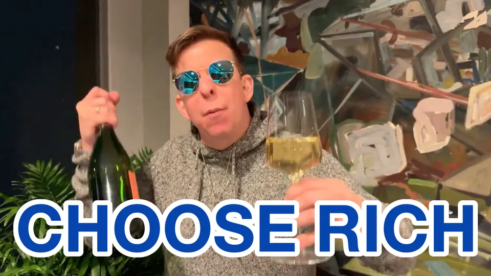 A man wearing polarized aviator style sunglasses holds a bottle and a glass of champagne. &quot;Choose rich&quot; is superimposed